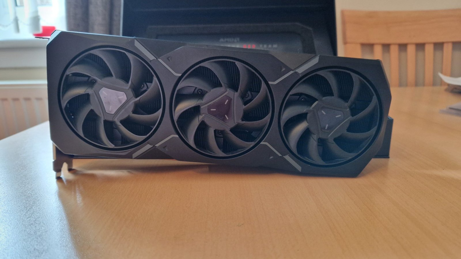AMD Radeon RX 7900 XT review image showing the graphics card from the underside