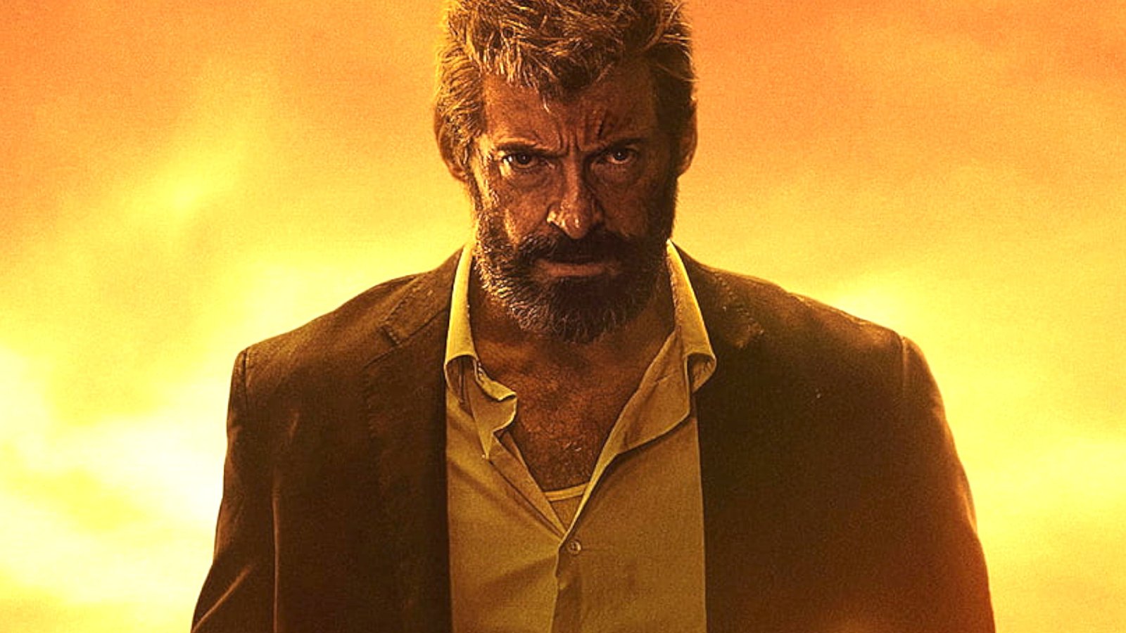 Hugh Jackman in front of a sunset during one of the best superhero movies ever made, Logan.