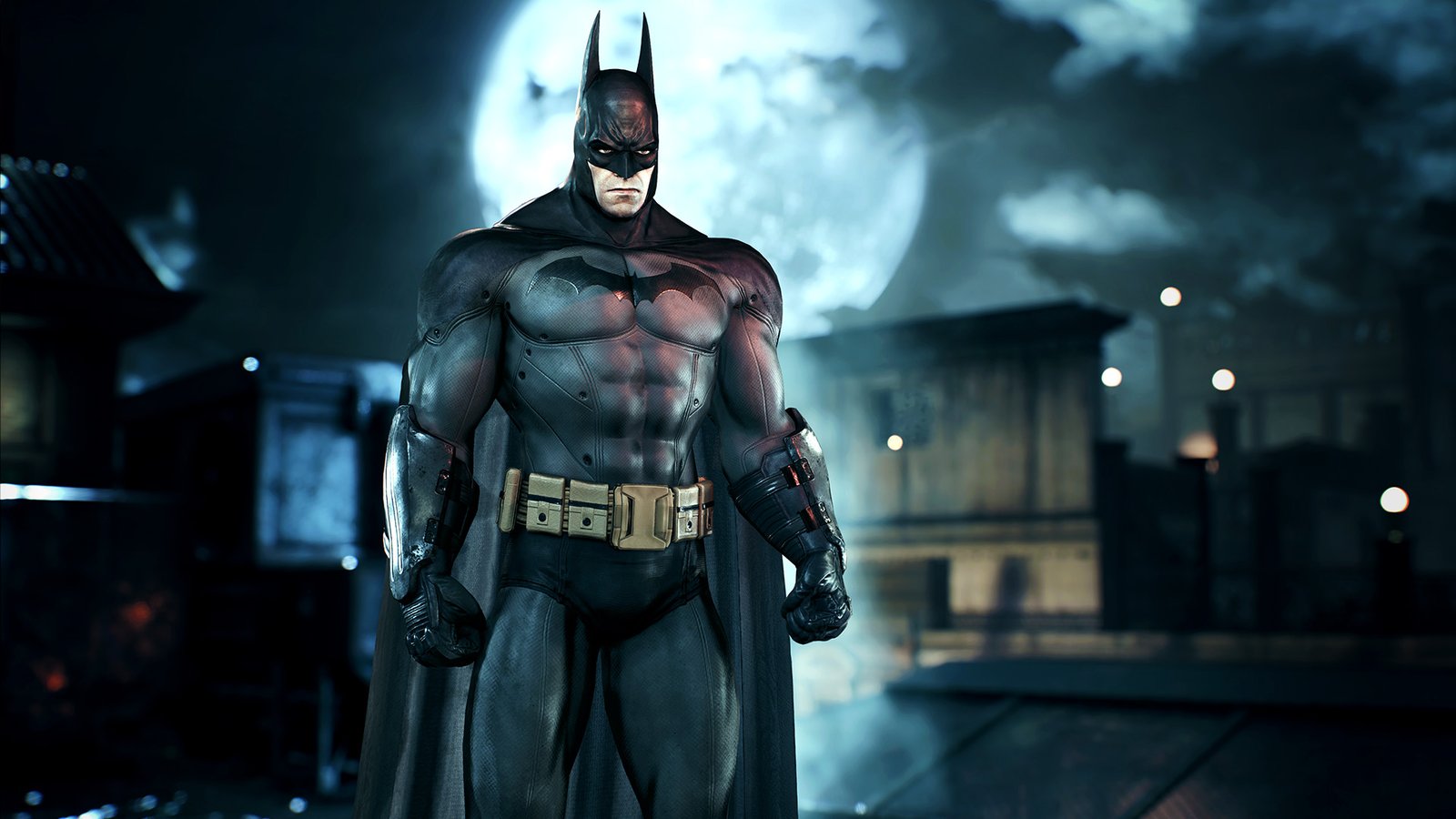 Batman standing in front of the moon during one of the best Batman games, Batman Arkham Knight.