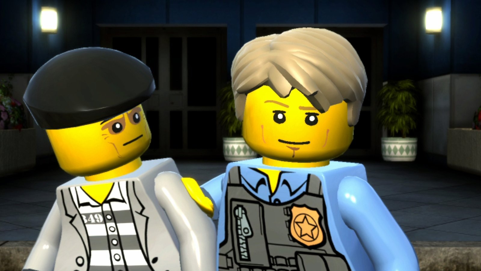 Chase McCain holding a criminal with a slight smile on his face in Lego City Undercover, showing our pick for the best thriller and crime-based Lego game of all time.