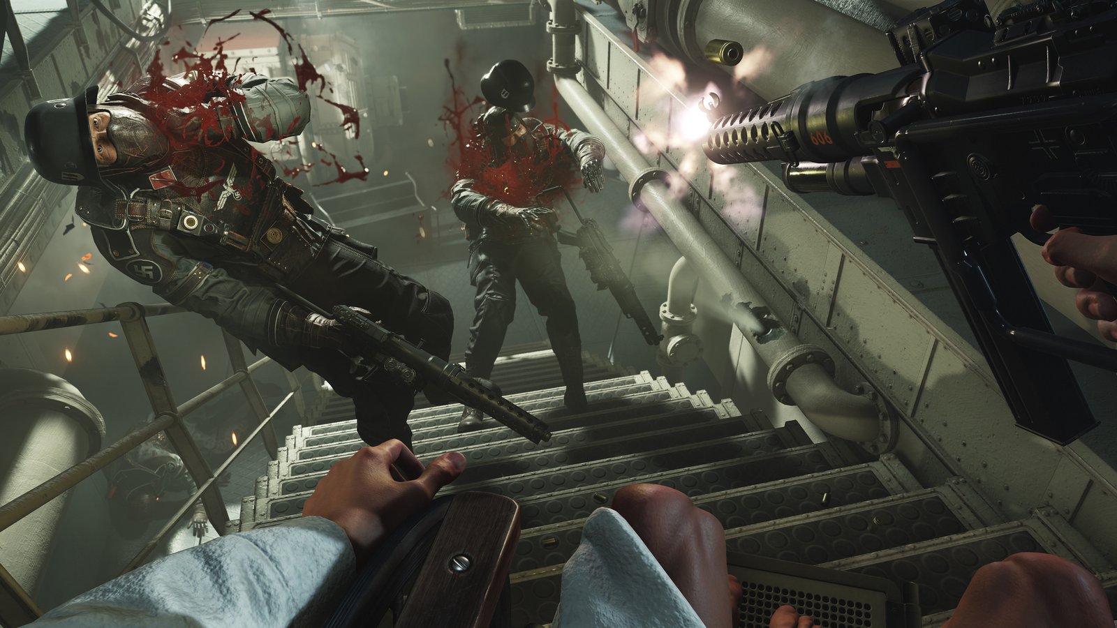 Two Nazi zombies being shot in the next and falling down a flight of stairs during the FPS game Wolfenstein 2.
