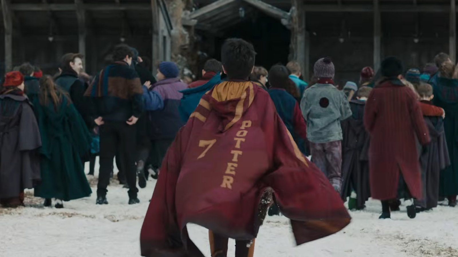 Harry walking to a match in the trailer for the Harry Potter series.
