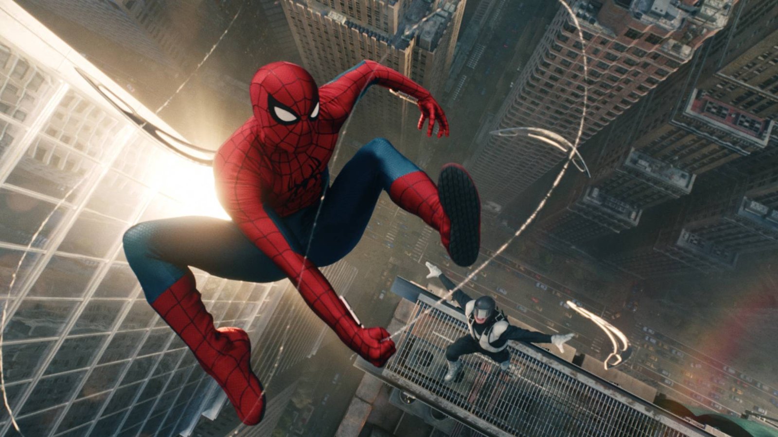 Spider-Man swinging while the villain Boomerang attacks in the sky