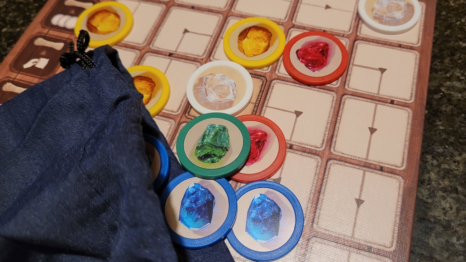 Splendor Duel bag and tokens on the board