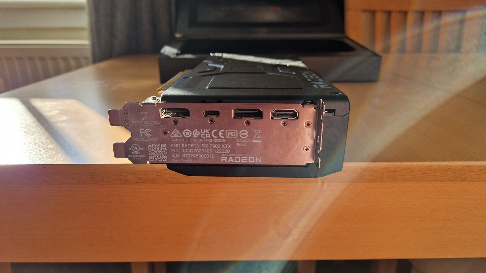 AMD Radeon RX 7900 XTX from the back side showing the various connection ports
