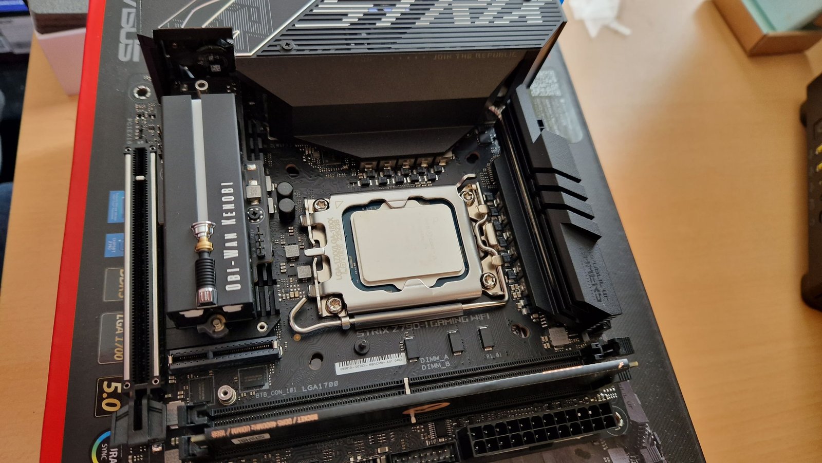 Intel Core i5-13600K installed on a motherboard with RAM and a Star Wars Obi Wan Kenobi Seagate Firecuda 530 SSD next to it