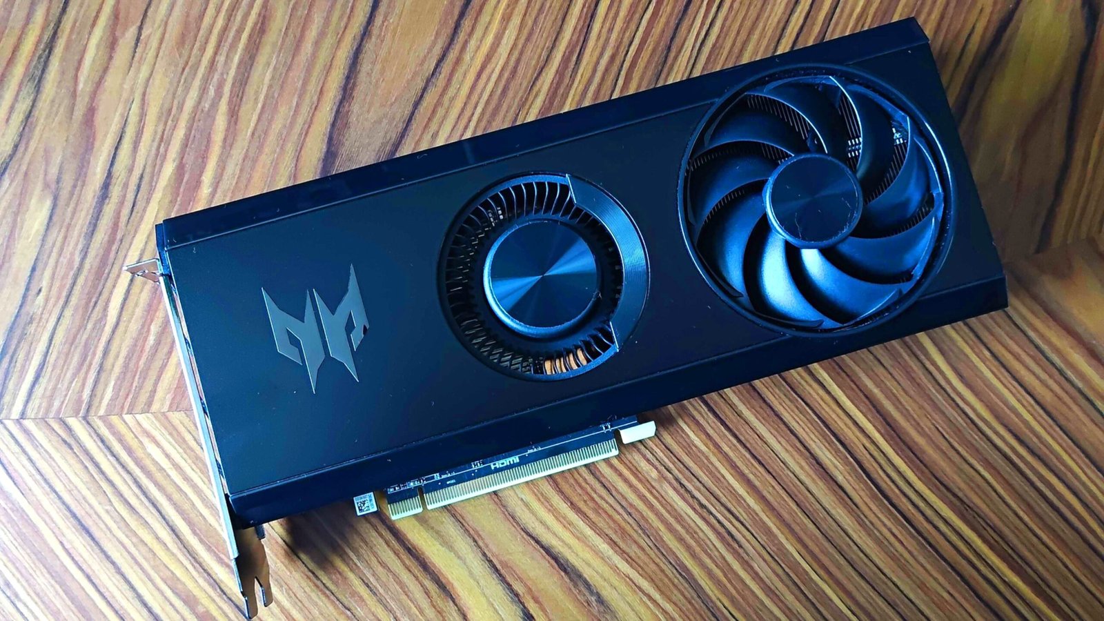 AMD Radeon RX 7600 lying on wood table