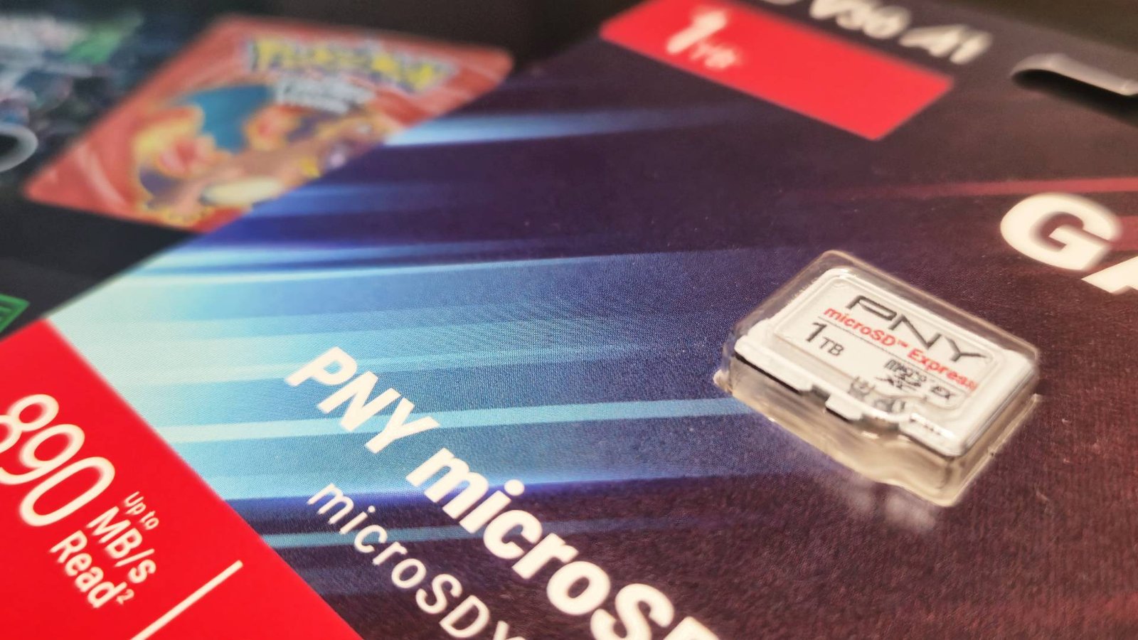 Photo of the 1TB PNY Switch 2 microSD Express card sitting on the top of the handheld.