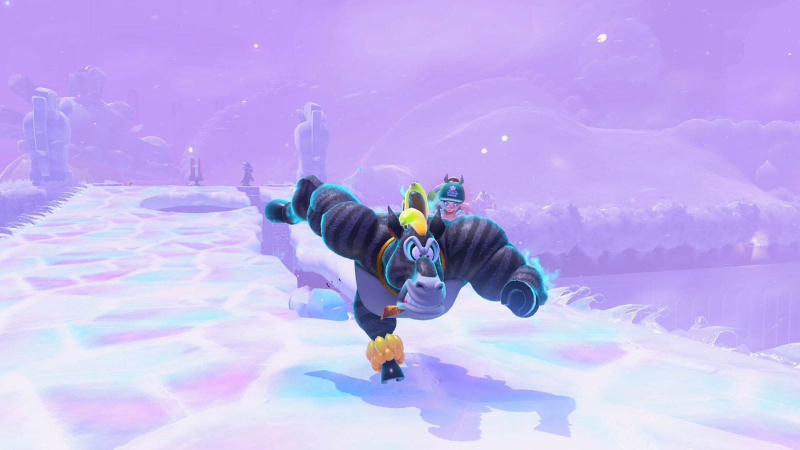 DK in zebra form runs across a melting ice bridge in Donkey Kong Bananza