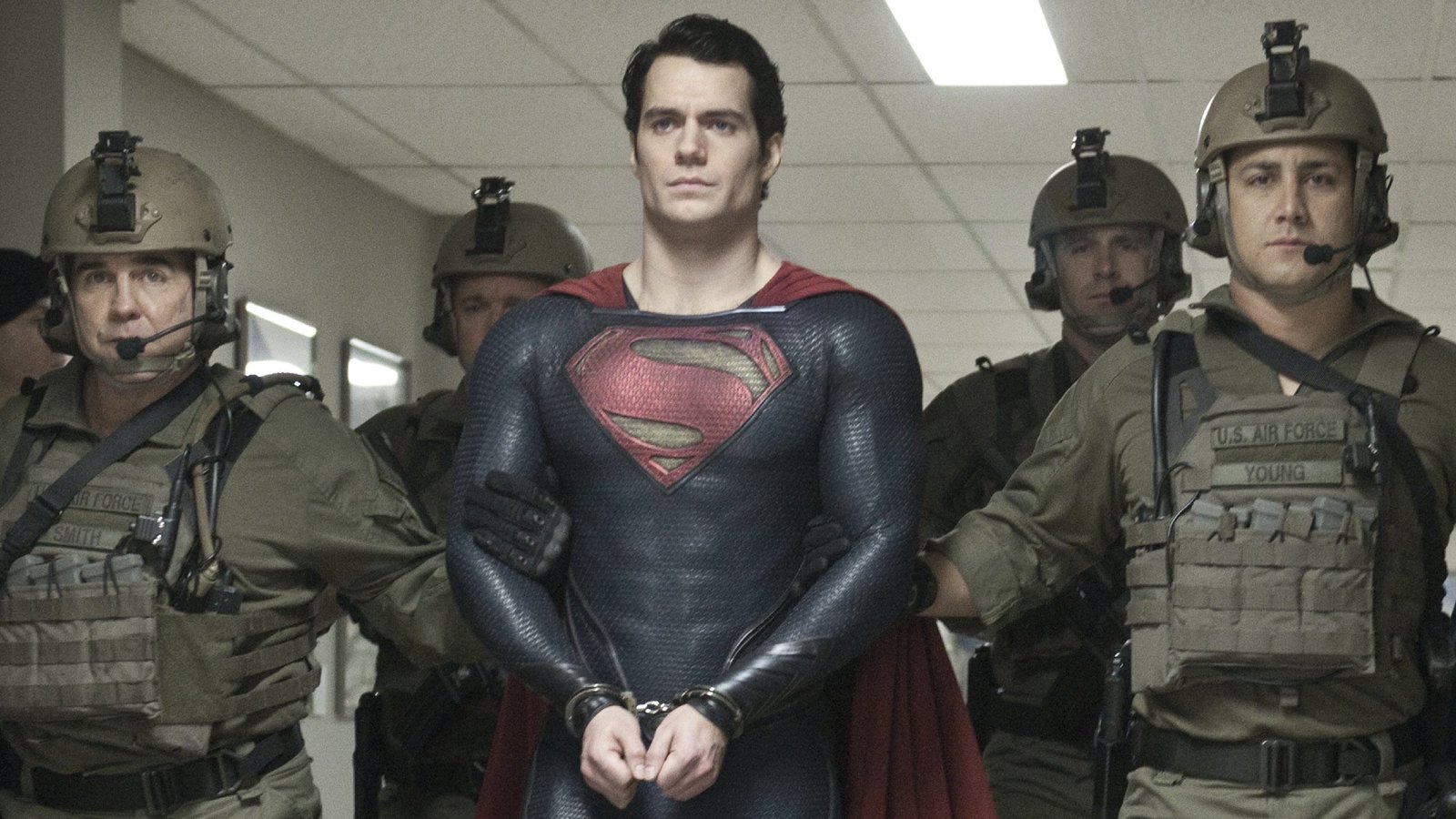 Henry Cavill as Superman being held by the military in the DC movie Man of Steel