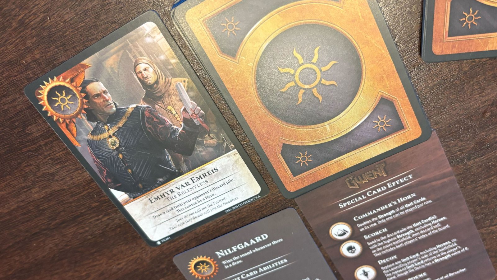 Gwent cards laid out on a wooden surface