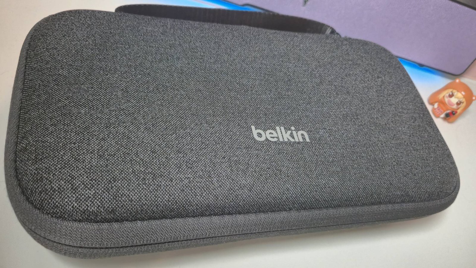 Photo of the Belkin Switch 2 case sitting on a white desk.