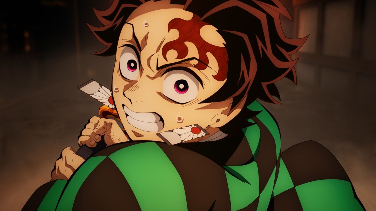 A determined Tanjiro swinging his sword in Demon Slayer Infinity Castle