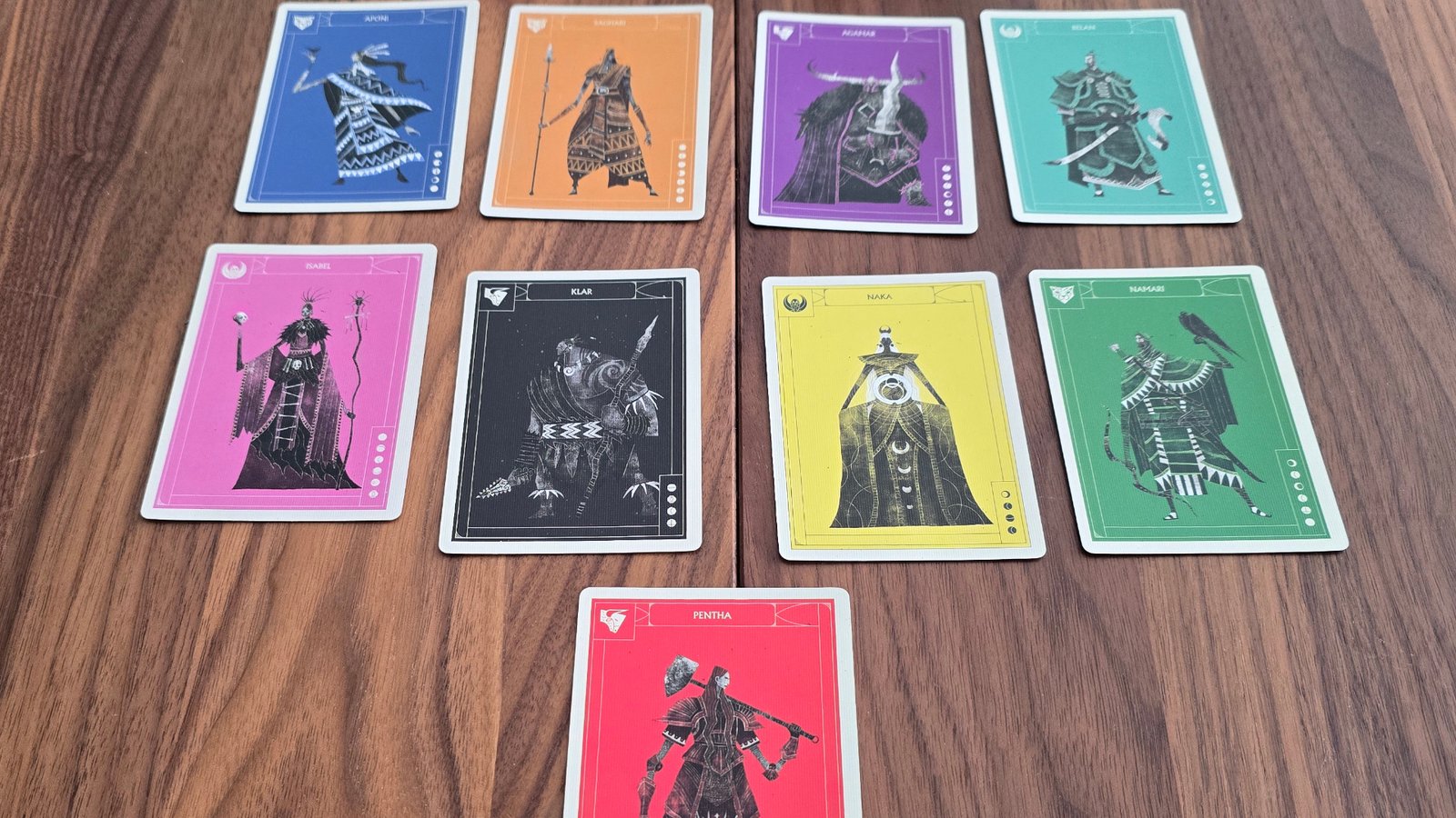 Veiled Fate cards laid out on a wooden surface