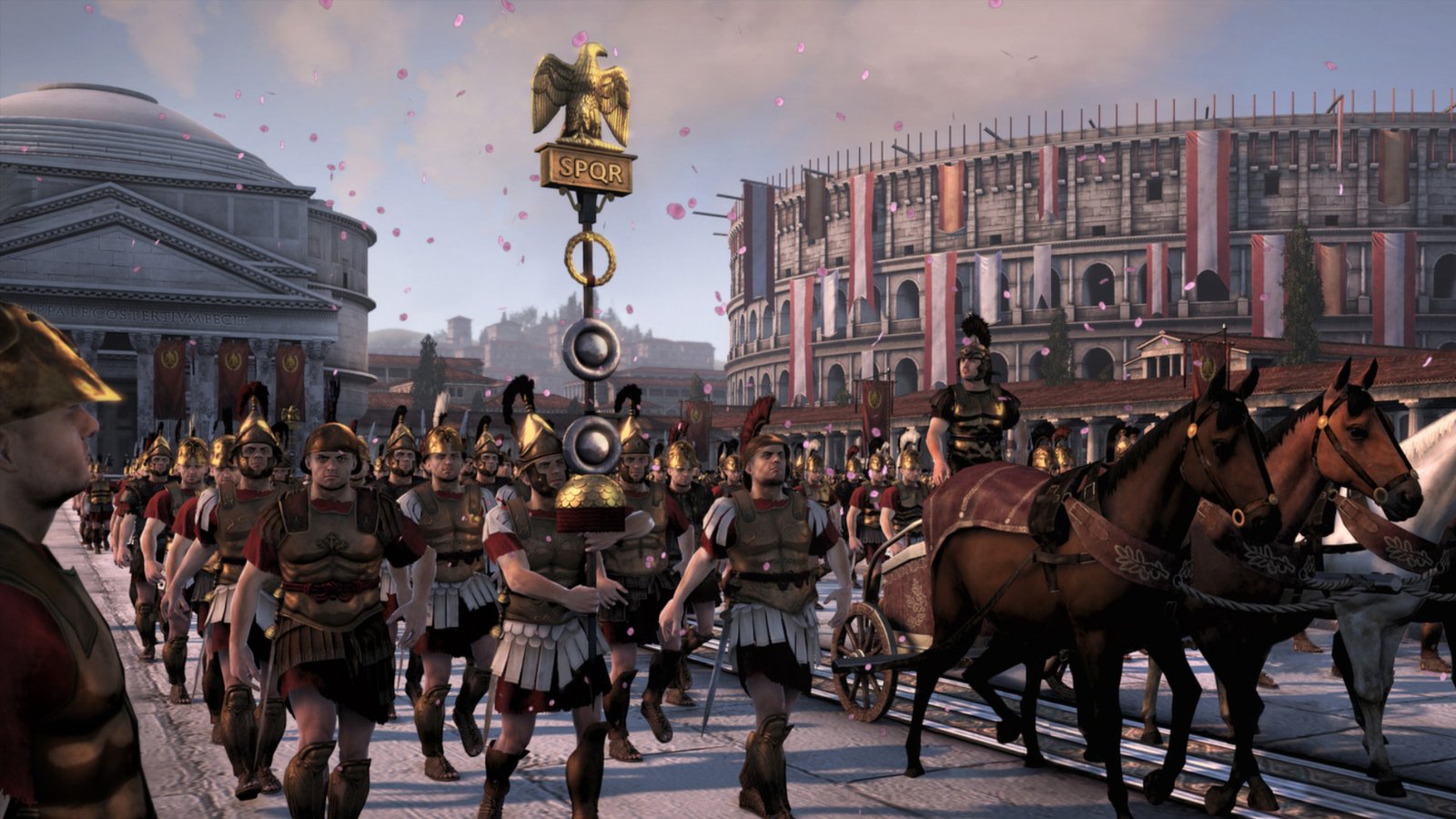 A legion walking past the Roman colosseum during one of the best Total War games, Total War: Rome 2