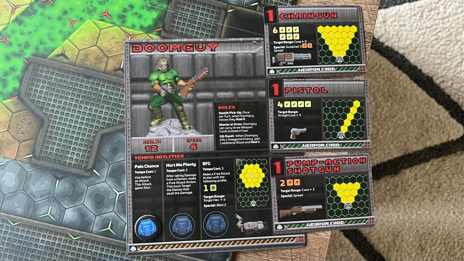 Top down view of Doom Guy character card loadout in Doom Arena Board Game