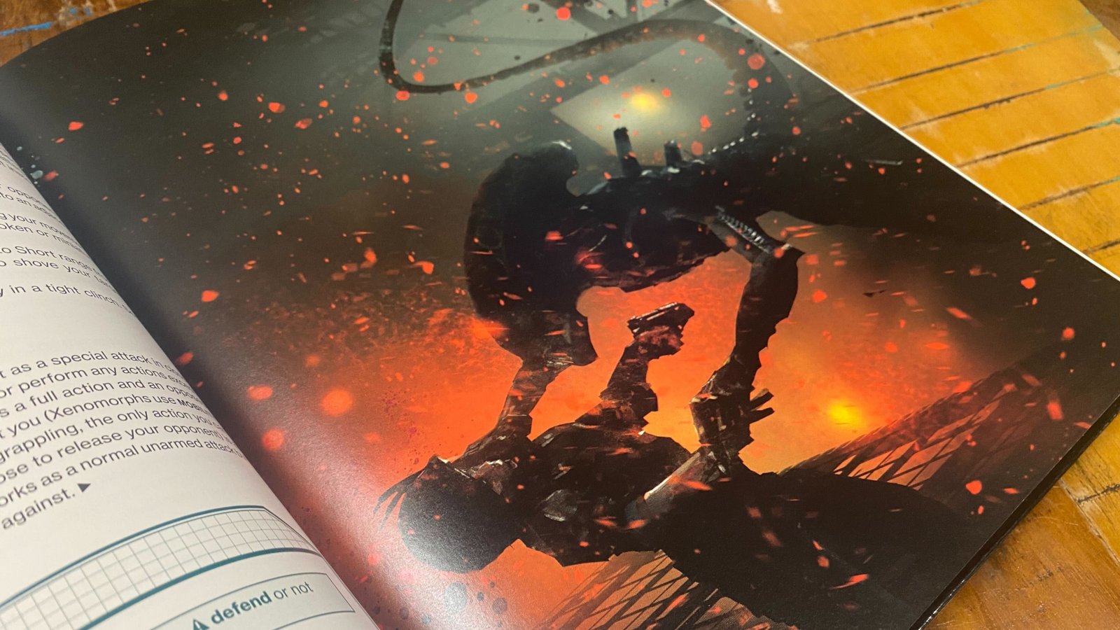 Alien RPG artwork showing a xenomorph attacking a Colonial Marine in a fiery environment
