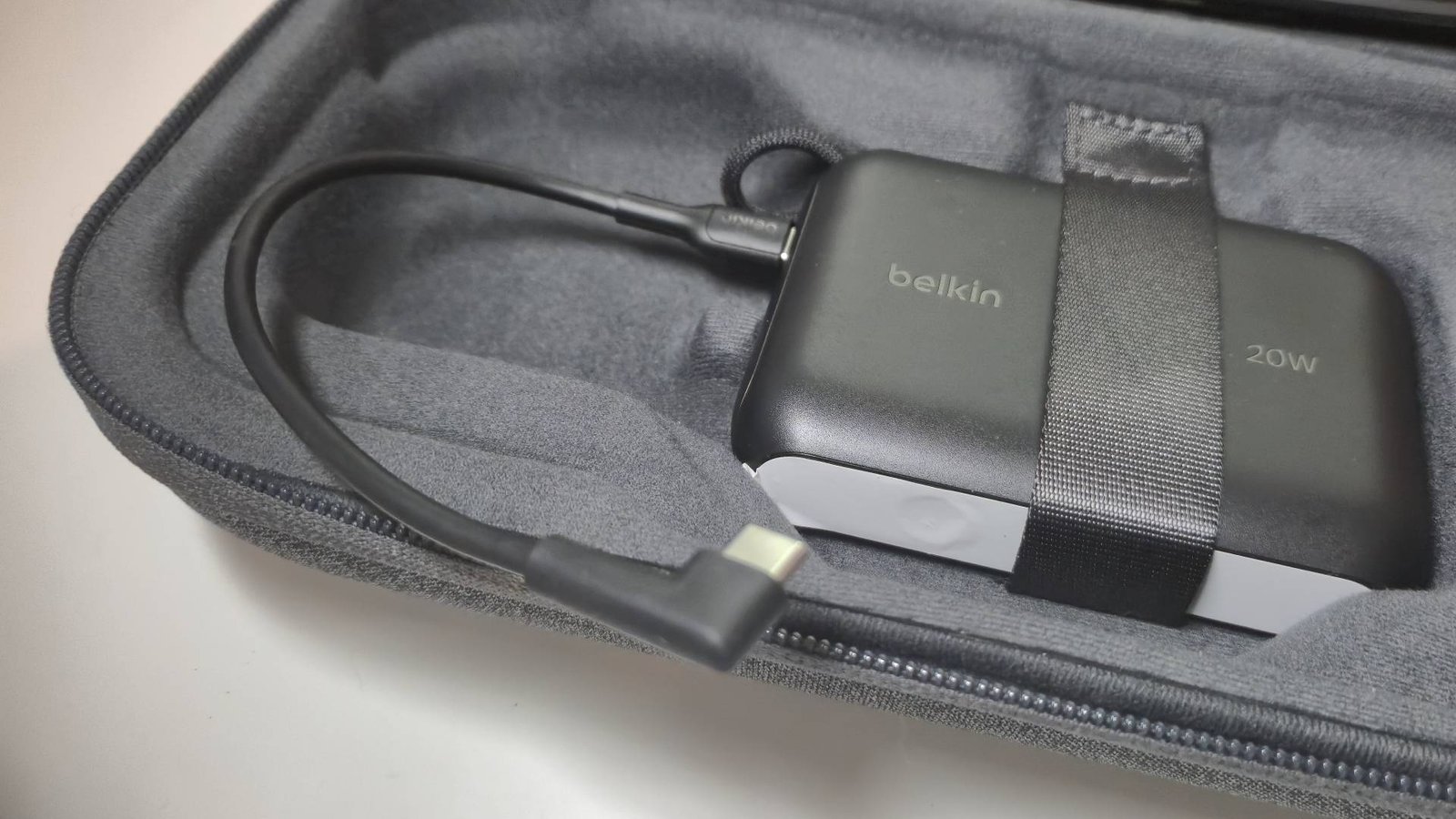 Photo by Rosalie Newcombe of the power bank sitting in the bottom of the Belkin Switch 2 case.