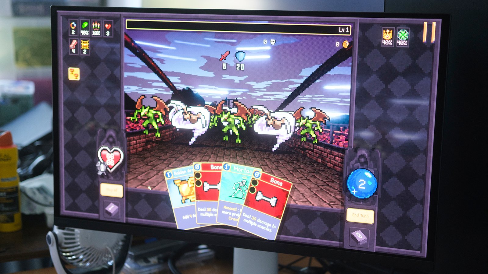 Close up of BenQ Mobiuz EX271UZ monitor with Vampire Crawlers gameplay on screen.