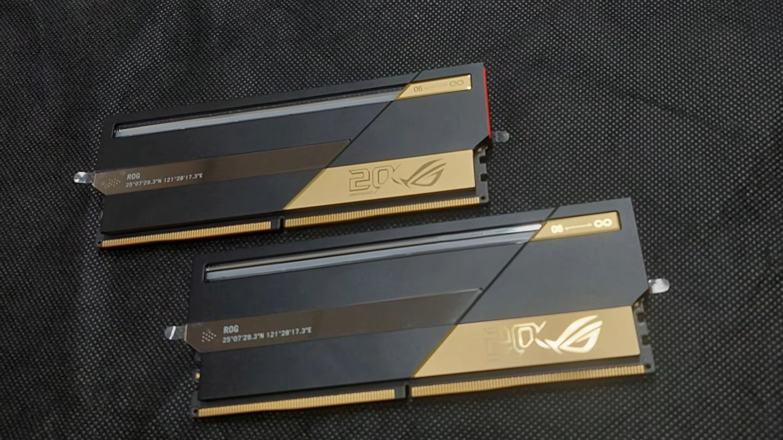 Two sticks of Asus ROG Edition 20 RAM shown lying on a surface