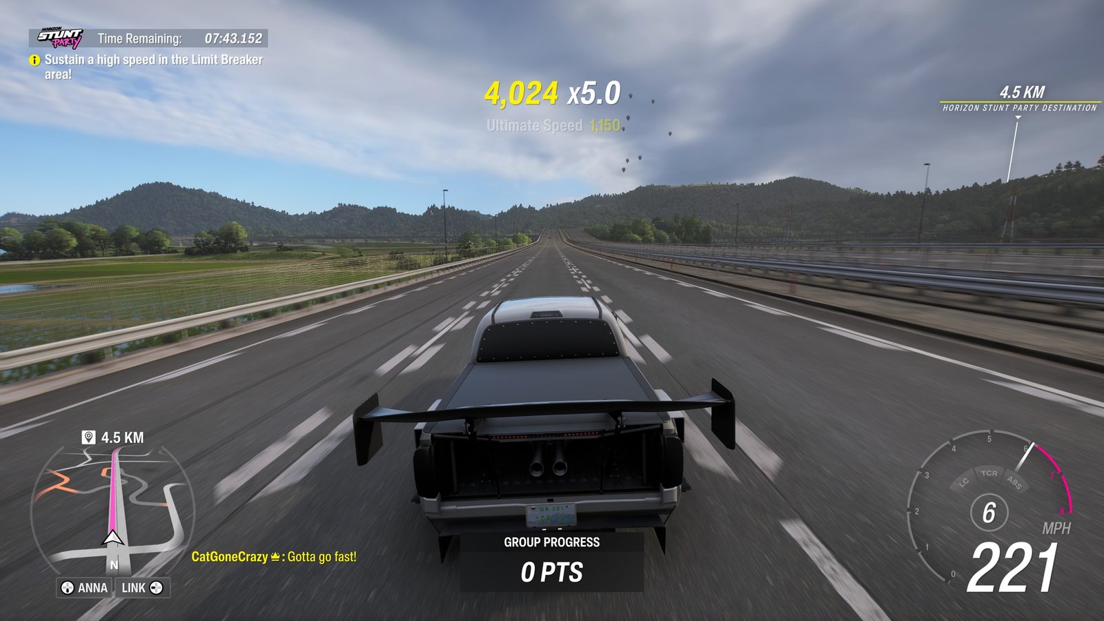 A car blurs down the highway in a drag race in Forza Horizon 6