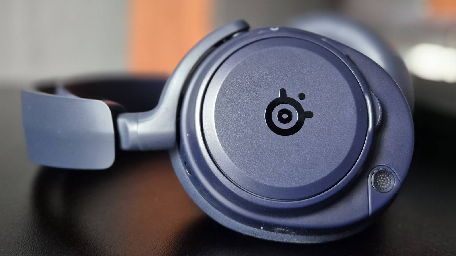 Close up of the logo on the SteelSeries Arctis Nova Pro Omni headset.