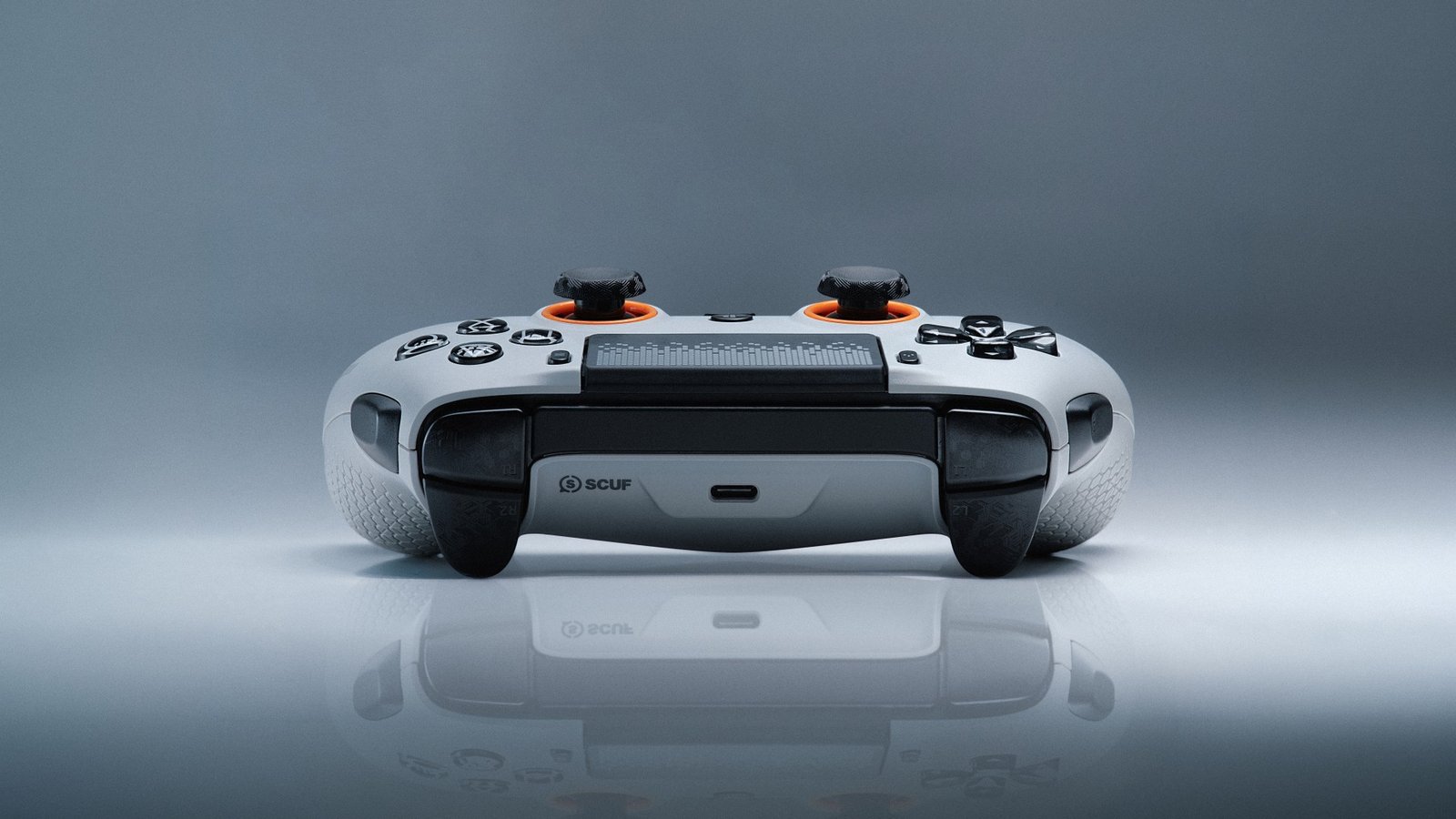 Scuf Omega PS5 controller on a gray background