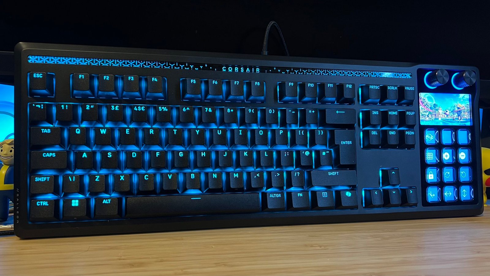 Corsair Galleon 100 SD gaming keyboard on a wooden desk
