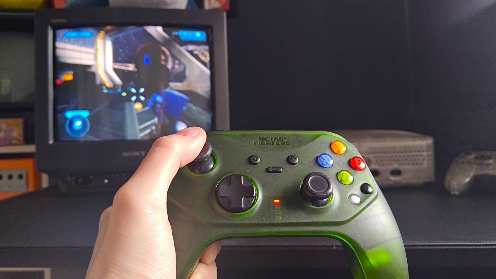 Retro Fighters Hunter  with Halo 2 running on OG Xbox in backdrop.