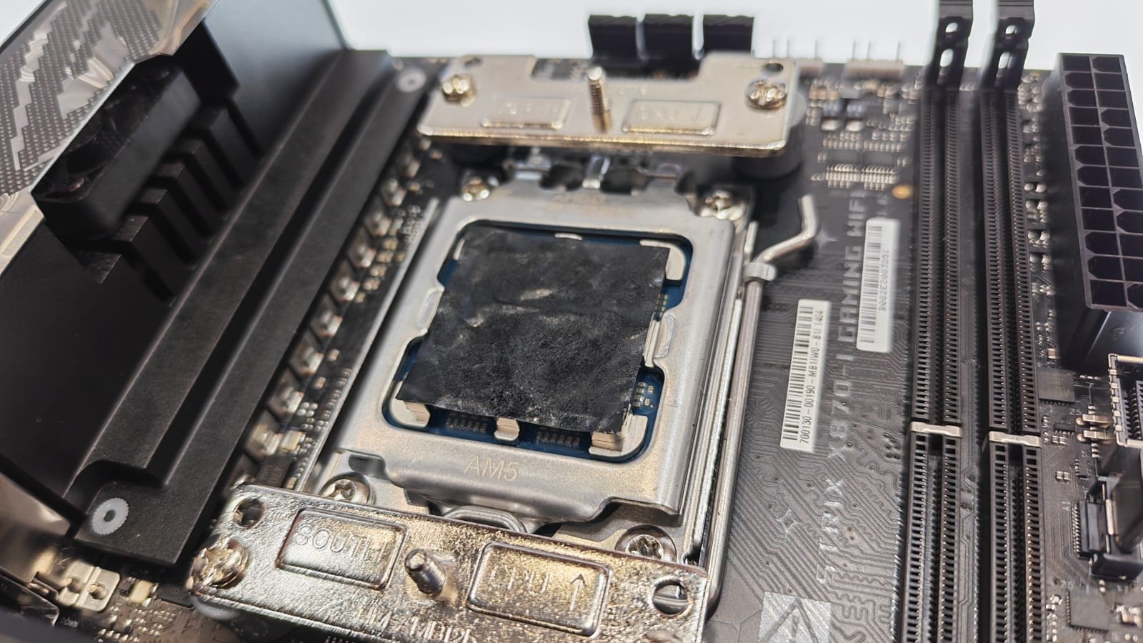 An AM5 CPU with a NT-CP1 Carbice Carbon Nanotube Thermal Pad on top of it