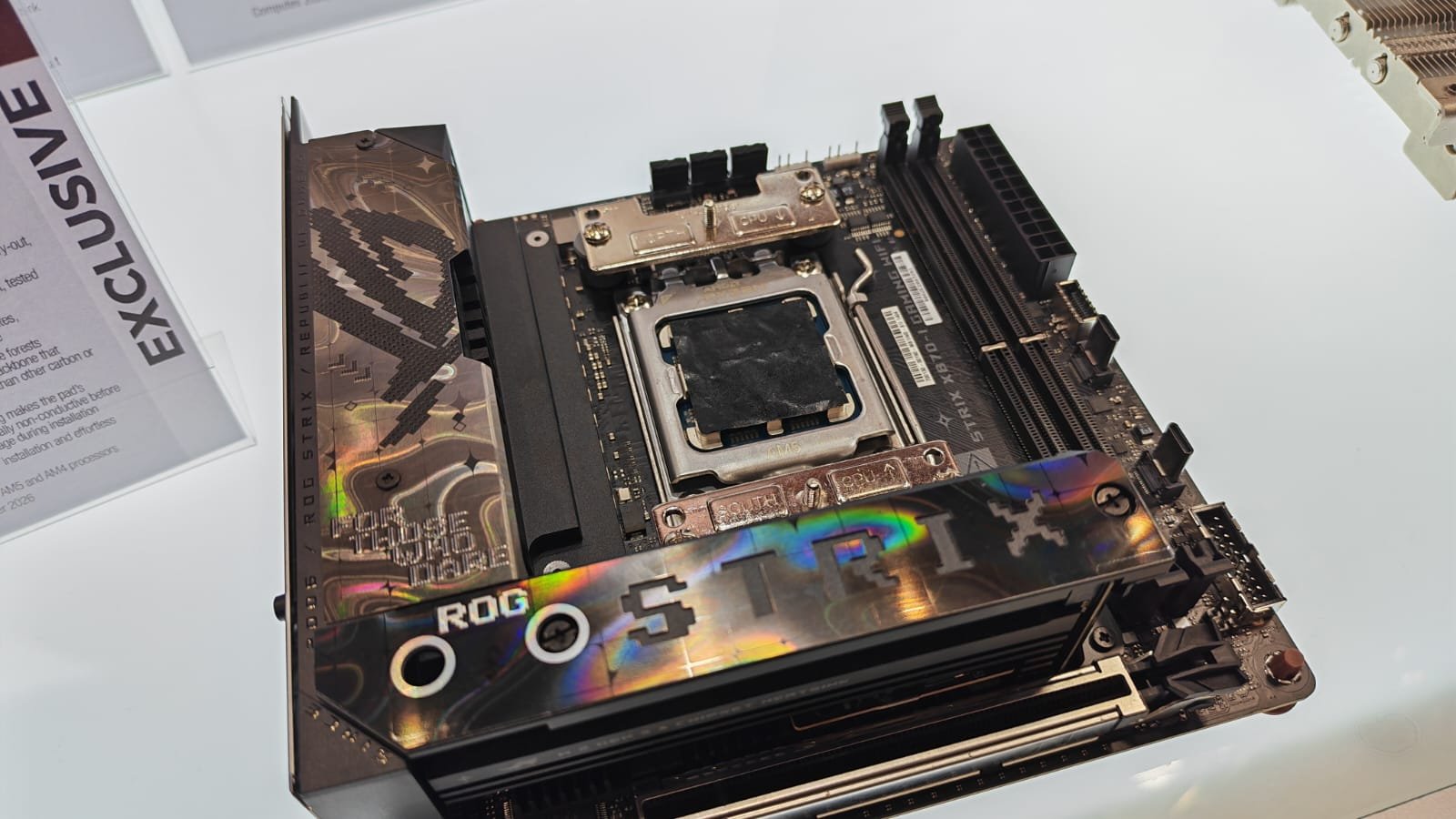 A gaming motherboard and CPU with a NT-CP1 Carbice Carbon Nanotube Thermal Pad on top of it