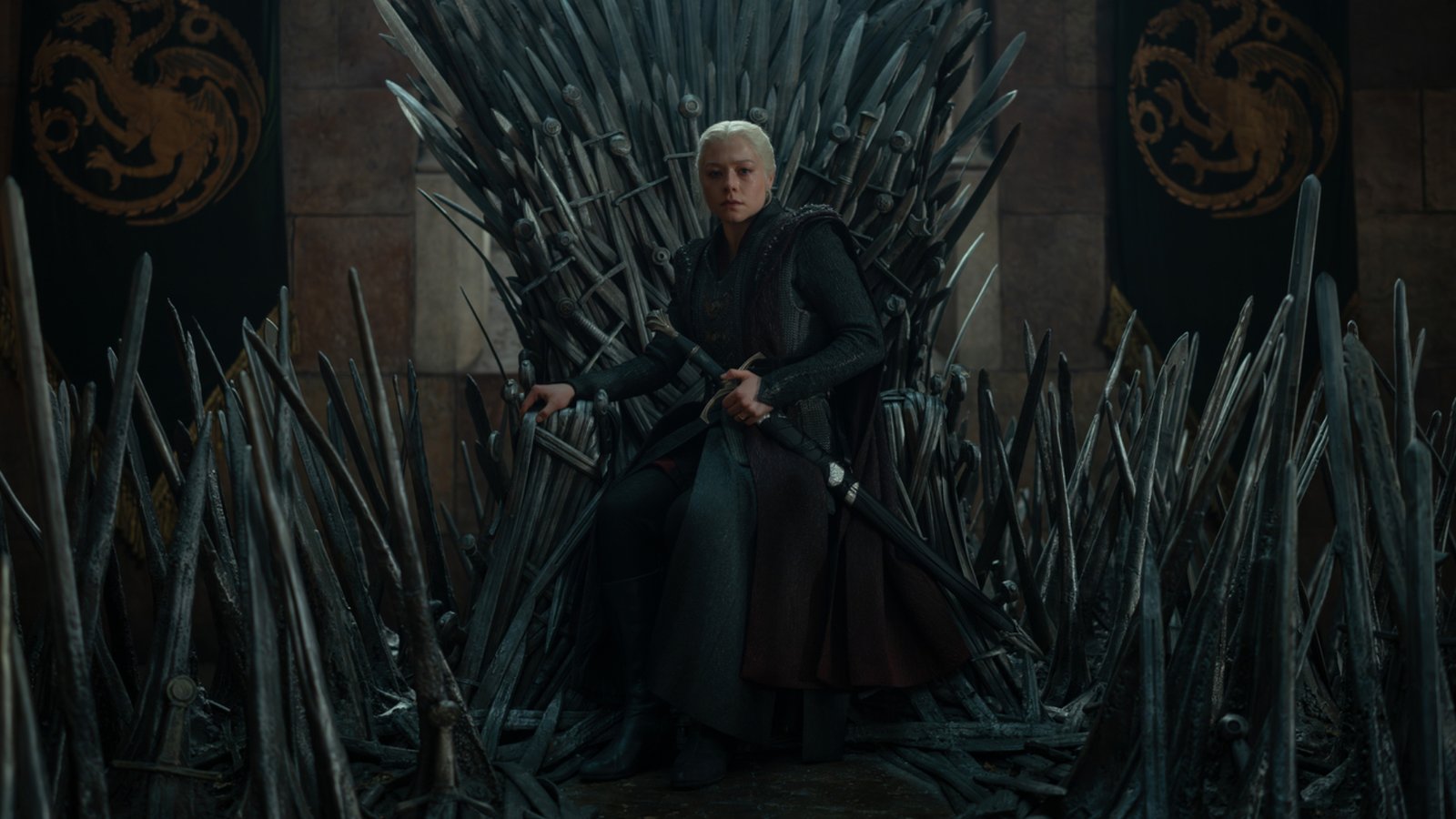 Emma D'Arcy as Rhaenyra Targaryen sitting on the Iron Throne in House of the Dragon season 3 episode 2
