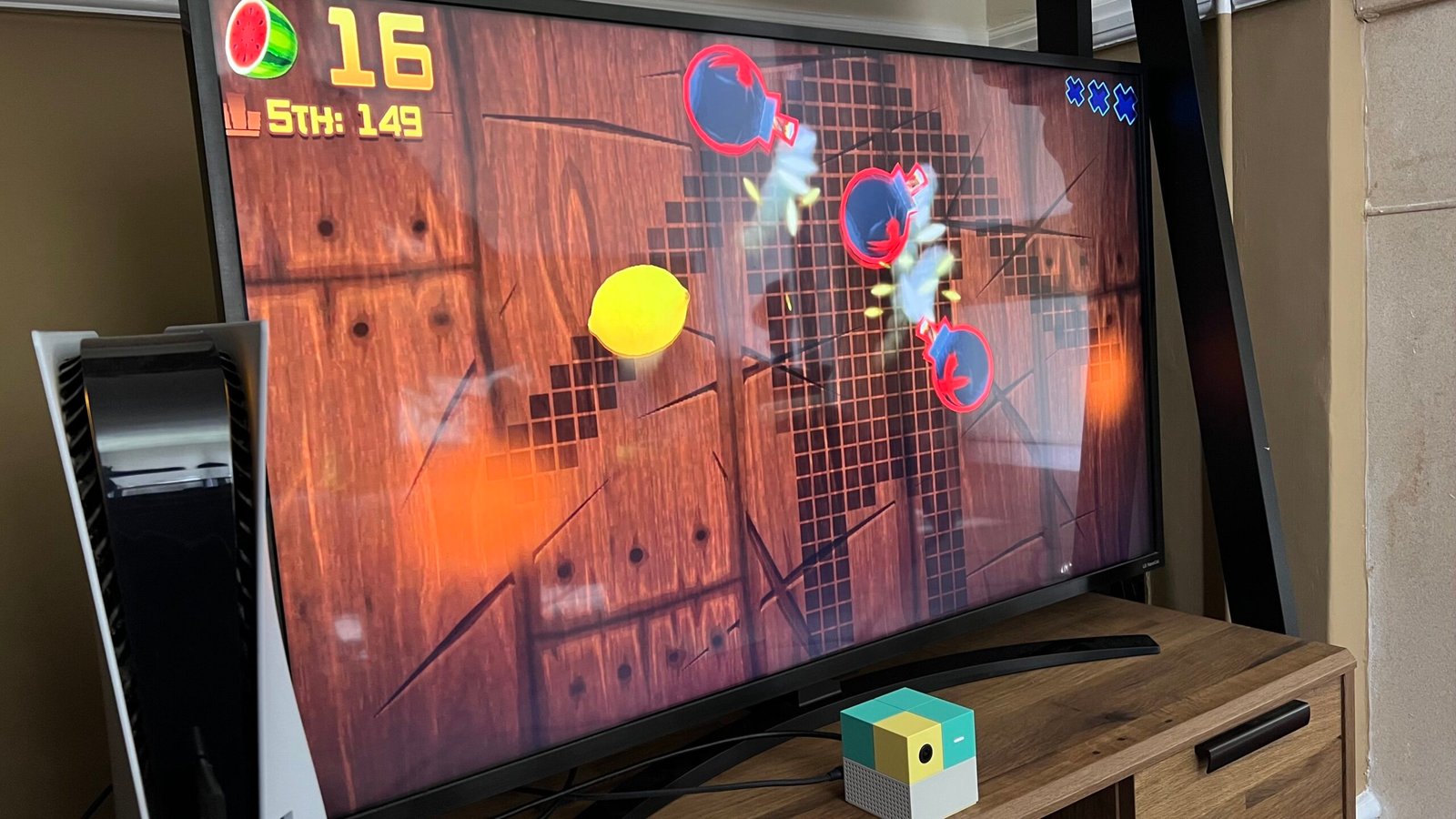 Nex Playground running Fruit Ninja while a player plays