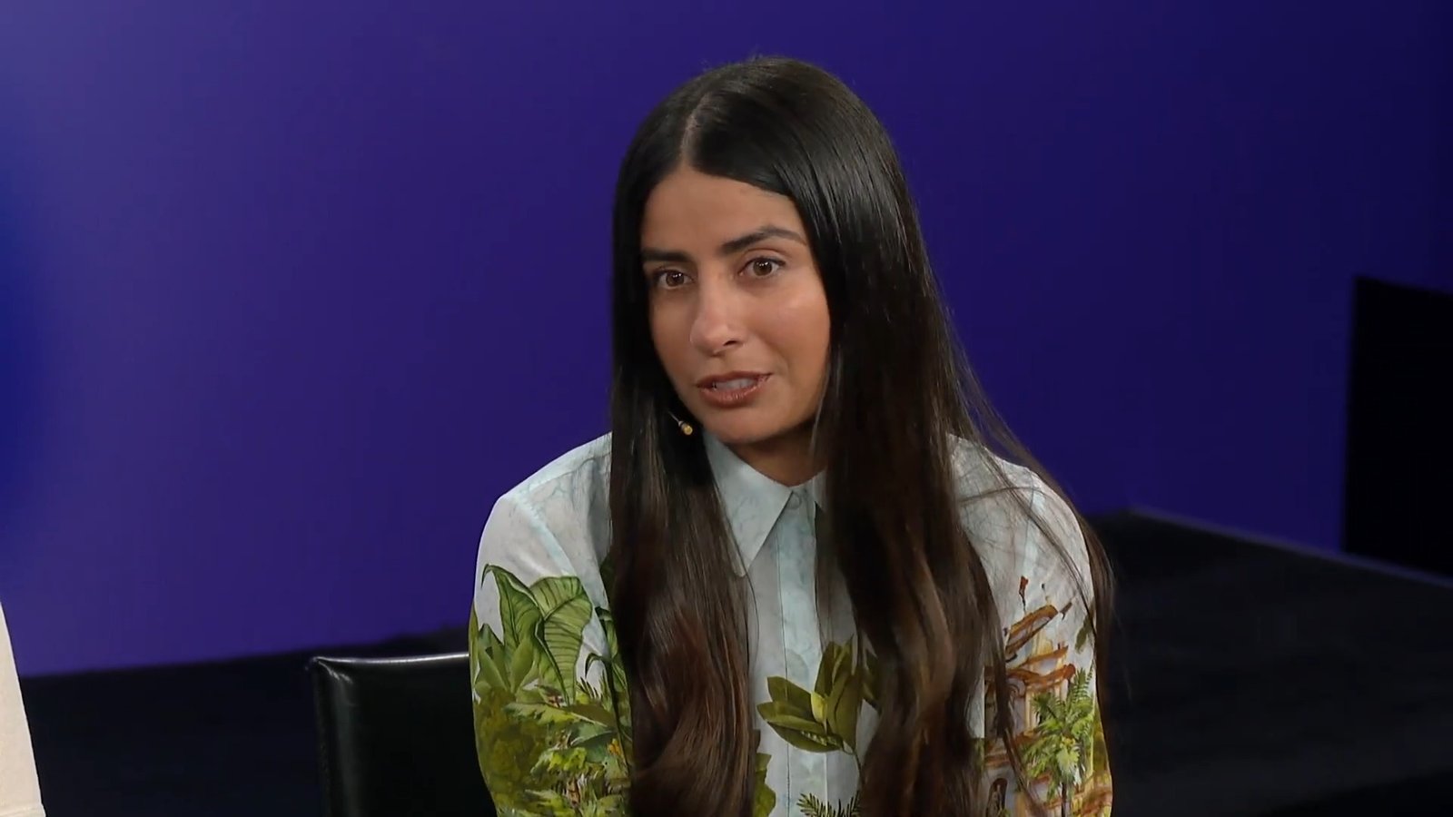 Asha Sharma in white shirt with leaf pattern