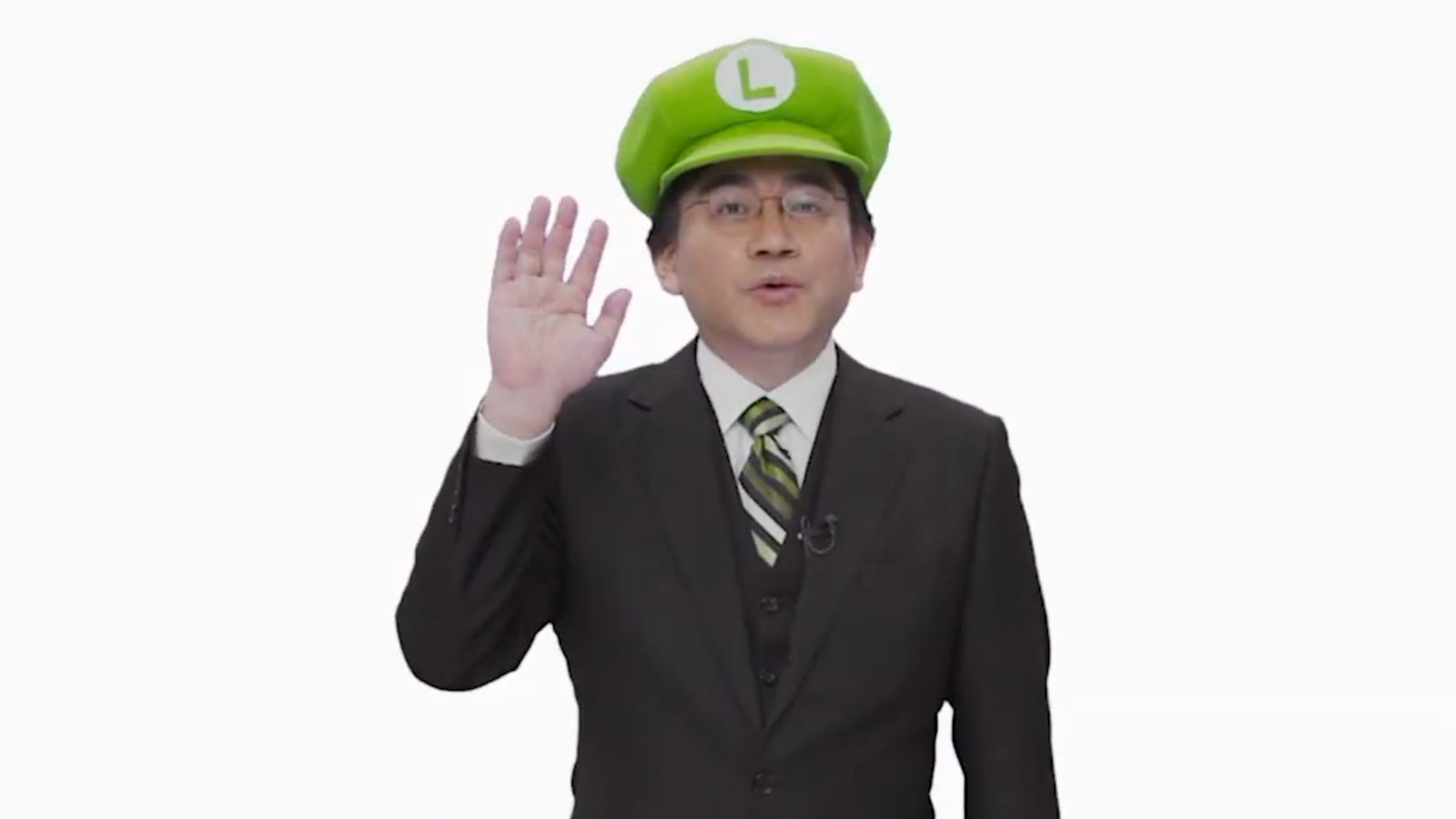 Former Nintendo president Satoru Iwata in a Luigi hat